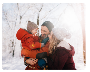 family in snow